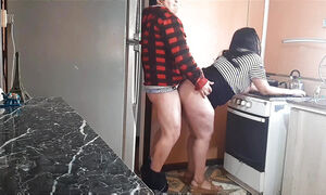 Her stepfather fucks his horny stepdaughter in our kitchen. Her mother almost catches him.