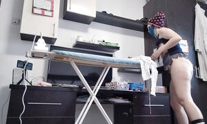 Amateur mom does housework naked.