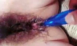 middle aged wife inserted a vibrator in her pussy