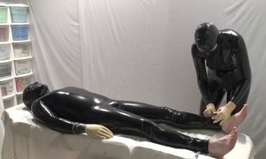 Mrs. Dominatrix and her experiments on a slave. 2 angle