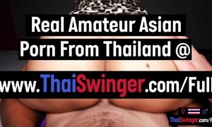 Big ass Thai MILF amateur gives a horny sex massage to her big dick client