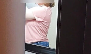 Peaking in on milf in the bathroom