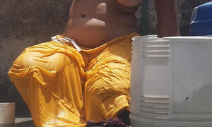 Desi stepsister is taking a bath in the open bathroom, undressing and showing beautiful head body, stepbrother is seen bathing s
