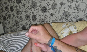 Wanking while my wife watches