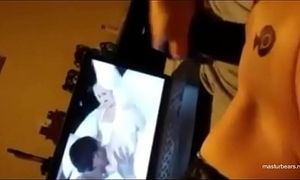 Adrianne fucktoys coochie while eyeing a porno vid