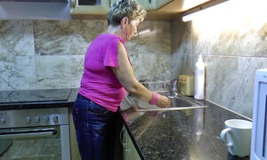 Busty older woman gets fucked in the kitchen